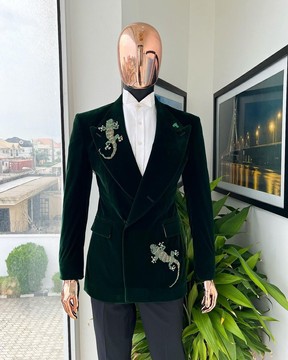 A Sacramento green “agama” soaked velvet peak lapel single button double breasted suit