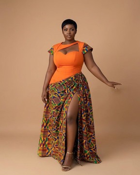 Vibrant Orange and Kente Print Asymmetrical Cutout Maxi Gown with High Slit