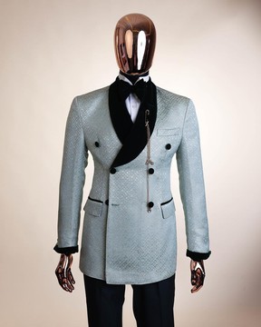 Un revers châle, croisé, costume vert menthe bleu marine éclaboussé cousu