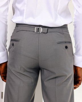 A Light grey, Gurkha pant with back and side metal adjuster.