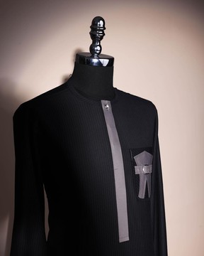 A black pencil stripe, front flap, buckle &amp; wings pocket, long sleeve African kaftan.