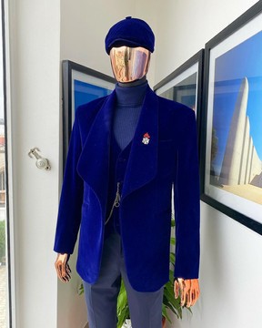 A “peaky blinders” soaked Italian velvet admiral blue shawl lapel suit