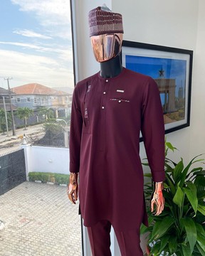 A Rosewood red traditional senator kaftan native.