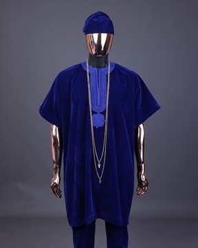 An Admiral blue daftan, sokoto &amp; Fila Yoruba African native.