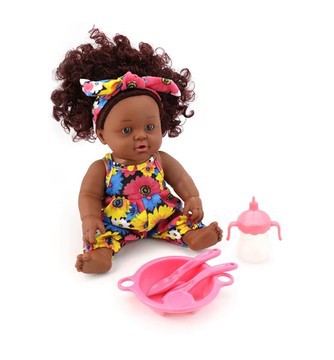 Akouba black doll plays at the dinette