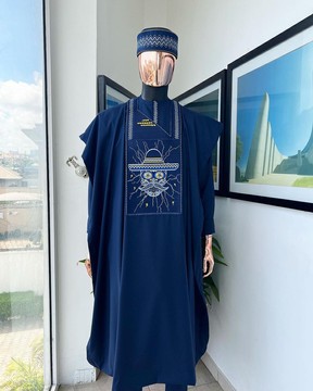 A Navy Blue, vexing demagogue metallic wire embroidery details Agbada, 3/4 sleeve kaftan.