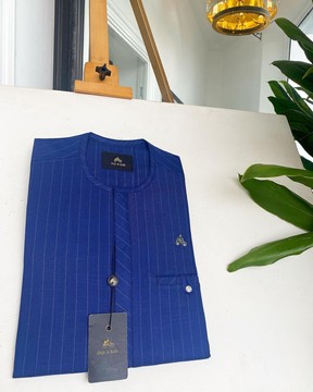 An Azure blue with Lapis blue stripe, kaftan