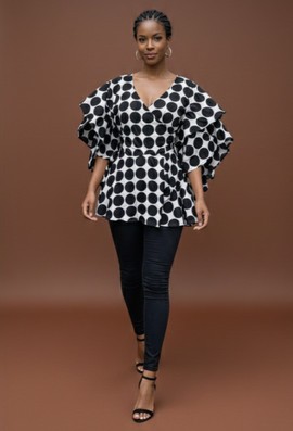 Bold Polka Dot Peplum Top with Statement Sleeves
