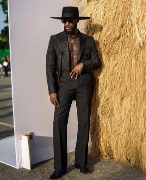 A charcoal black swollen mule deconstructed inverted lapel tuxedo suit