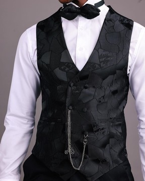 A Charcoal black, root &amp; scattered shape jacquard half double breasted waist coat.