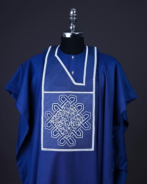 A cobalt blue, layered dodecagon embroidery detailing, kaftan native &amp; sokoto