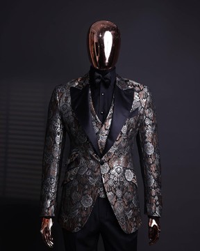A knitted, brown, silver &amp; black floral jacquard peak lapel suit