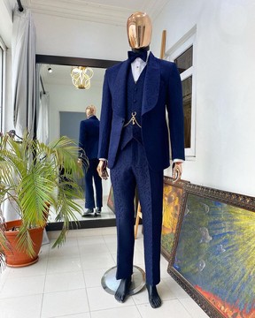 A navy blue shawl lapel floral pattern jacquard blazer suit