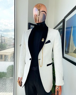 An Ivory white shawl lapel floral jacquard suit