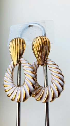 Beautiful pair of asymmetrical and original hoop earrings