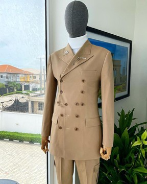 A “pirate” polished chinos, layered double breasted, 12 buttons, peak lapel pearl horn blazers suit