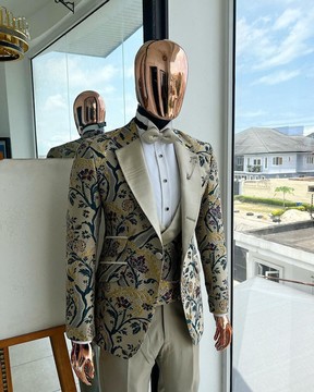 A Tortilla brown, emerald green, gold metallic floral jacquard, peak lapel tuxedo suit