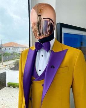 A Peak lapel Pantone Gold tuxedo suit