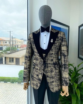 A “Mandarin” dispersed black &amp; gold Peak Lapel suit