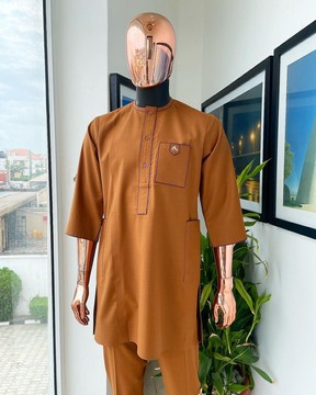 A Tawny brown, front flap, patch pocket, matching Swarovski buttons, paisley detailing kaftan