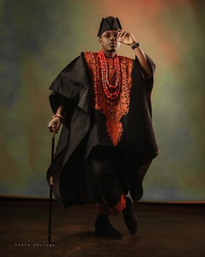 A Charcoal black, Arewa embroidery, front cut towards the back, traditional Agbada