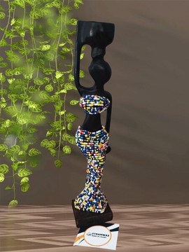 EBONY WOOD AND PEARL SCULPTURE STATUETTE