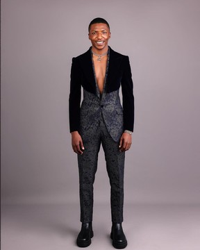 The “gifted” Navy blue half cut jacket &amp; silver wire metallic jacquard armless peak lapel suit
