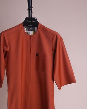 A fire orange &amp; black pencil stripe, zip line, 3/4 sleeve African senator kaftan native.