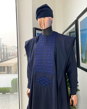 A navy blue, connected square embroidery design with matching Swarovski stone Agbada