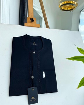 A Charcoal black, out flap interconnected embroidery &amp; a Swarovski button details African kaftan