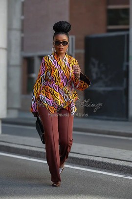 AMARI LONG SLEEVE PEPLUM TOP.