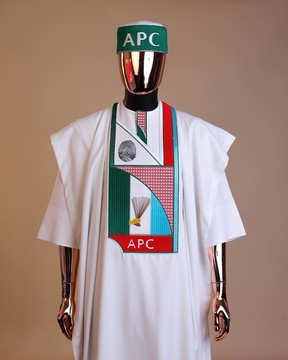 A white ,APC ( All Progressive Congress) pattern embroidery agbada