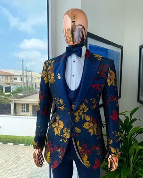 The “mandarin” gold, navy blue &amp; red splashed jacquard peak lapel suit