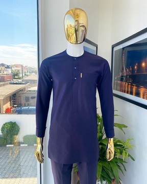 An Eggplant purple traditional senator kaftan native.