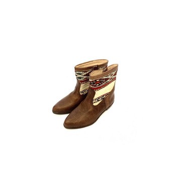 High-end handmade genuine leather and kilim boot.
