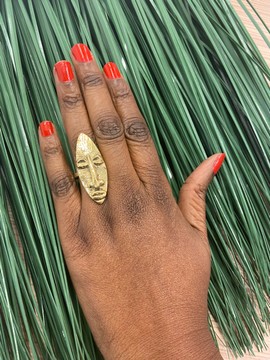 Beautiful bronze ring "The face"