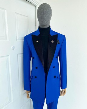 A royal blue peak double breasted velvet lapel suit
