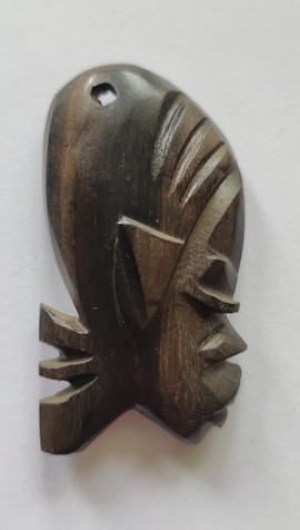 ebony wood fridge magnet carved in the shape of an African mask - fridge magnet