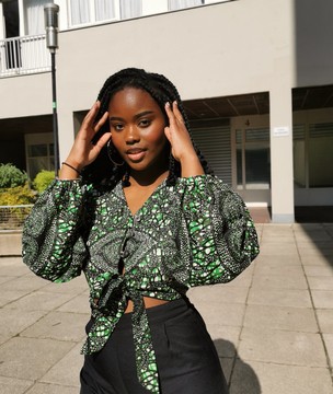 Buttoned wax blouse in green African fabric