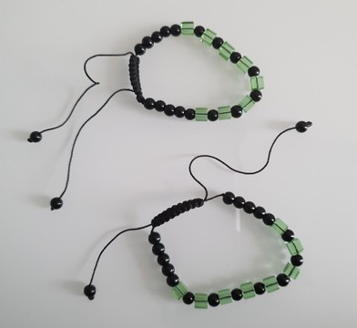 Set of two green bracelets