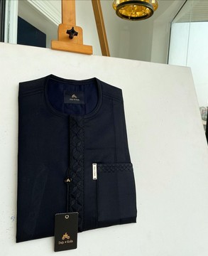 An Ebony black, Star dotted front flap &amp; pocket embroidery  kaftan native.