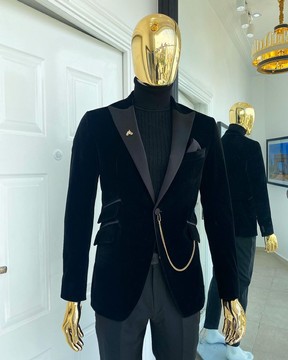 Un costume à revers châle noir anthracite en velours italien imbibé de revers en pointe