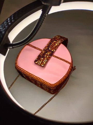 Unique chic leather and wax evening bag