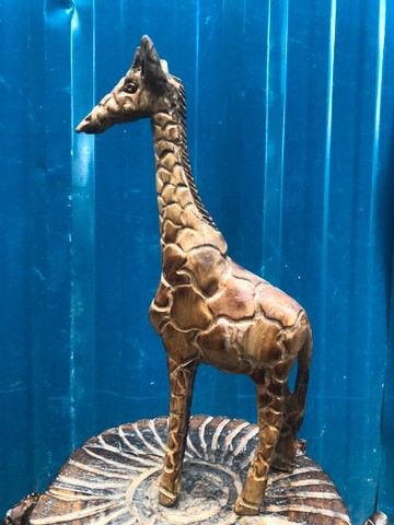 Wooden giraffe home decor curving