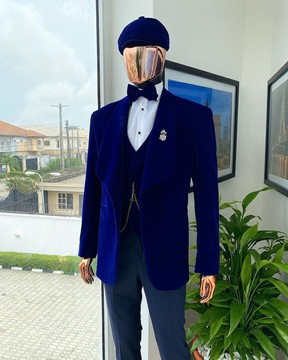 A “peaky blinders” soaked Italian velvet admiral blue shawl lapel suit