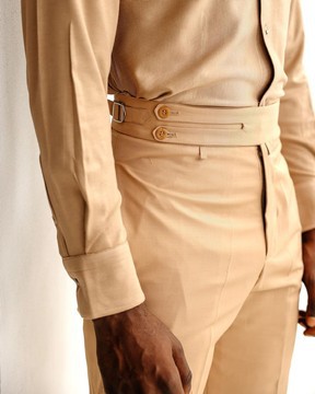 A light brown, Gurkha pant with a side metal adjuster.