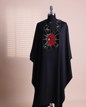 A charcoal black, “Spider-Man” embroidery details Agbada