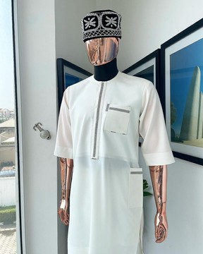 An ivory white, Swarovski Clear Crystal Trim bling flap and pocket detailing kaftan
