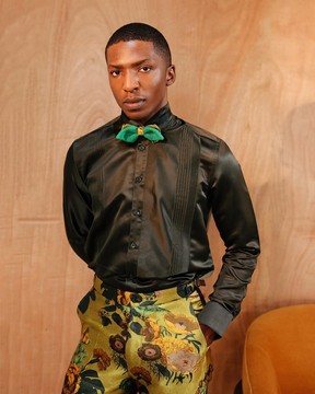 A Silk, dark seaweed green, pleated tuxedo shirt.