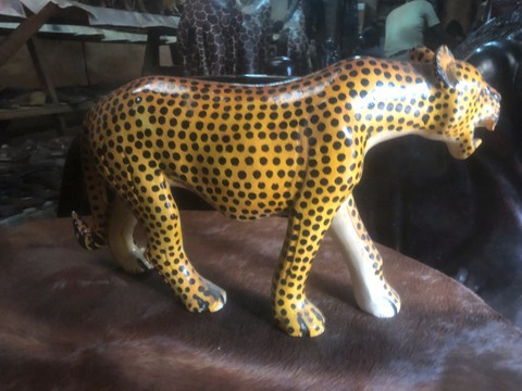 Wooden cheetah statue curving